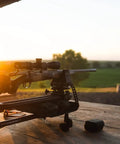 Rifle on a Lead Sled DFT 2 Rifle Shooting Rest with Adjustable Ambidextrous Frame for recoil reduction and stability at sunset.