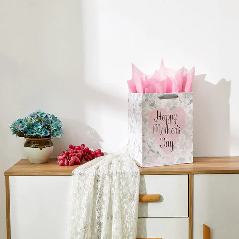 Large 13 Inch Gift Bag With Tissue Paper And Greeting Card For Mother's Day Birthdays Weddings Eco Friendly 3 Sheets Pink Tissue Included Ready To Gift In Style on table with flowers