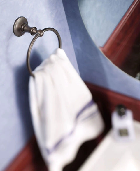 Danbury Collection Oil Rubbed Bronze Hand Towel Ring European Single Post Bathroom Accessory with towel on blue wall