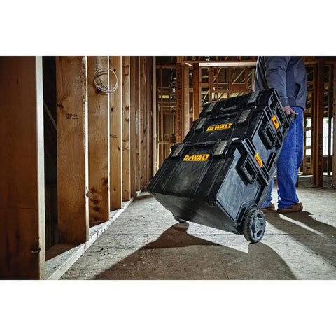 Man pulling Rugged ToughSystem Tool Box With Pull Back Lid For Maximum Storage Non Detachable Lid on a construction site