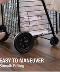 Folding Shopping Cart With Wheels For Grocery And Laundry, Lightweight Yet Durable Trolley in use on floor, close-up of wheels.