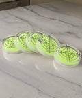 for spirit Bubble Level for Precision Measuring and Layout Tasks, set of translucent levels with markings on a marble surface.