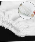 Close-up of the elastic cuff of Hardcore Canvas Arm Sleeves For Sandblasting And High Pressure Setup, showing the lightweight white material.