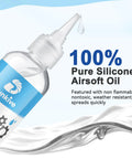 Silicone Airsoft Lubricant With Needle Oiler 6 oz bottle close-up with droplet showing non-flammable silicone oil label.
