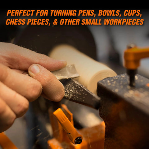 WEN mini benchtop wood lathe turning wooden piece with orange clamps visible