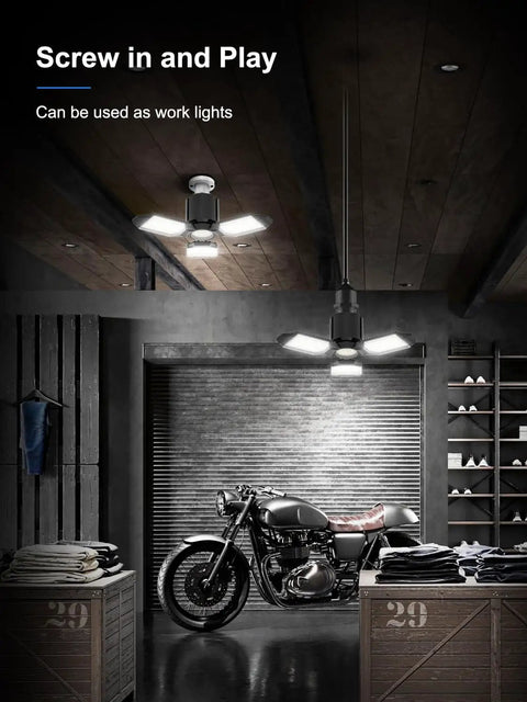 Two Pack LED Garage Lights 8000LM With 3 Plus 1 Deformable Panels 6500K Daylight Ceiling Bulbs illuminating a garage with motorcycle