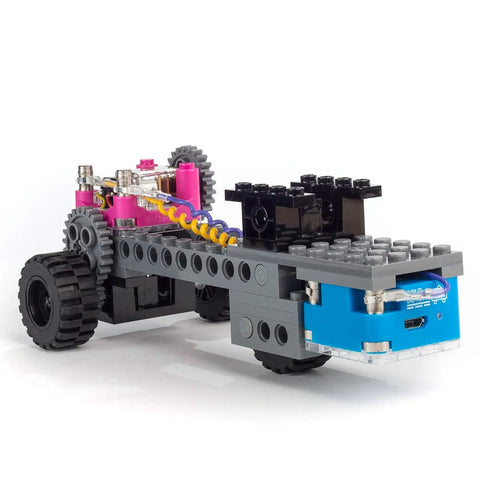 Gears Go Multi Vehicle Mobility Launch Kit with bricks and Circuit Cubes, showcasing a toy rig model with wheels and colorful parts.