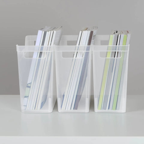 Three clear plastic storage containers with handles holding books on a shelf, part of a six-pack Narrow Shelf Bin With Handles, Clear Plastic Storage Container For Quick Easy Organizing On Shelves, Closets And Pantries, 6 Pack, Fits Standard Shelves, Measures 13 Inches Long, Five And Three Eighths Inches Wide, Nine And Three Quarters Inches High
