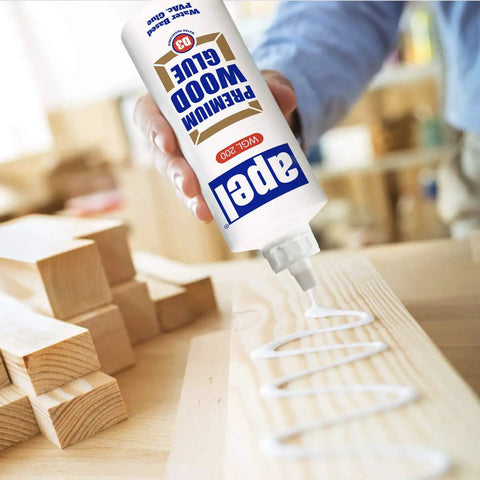 Go-To Water Resistant Wood Glue 16 Oz Two Pack Clear PVA Adhesive being applied to wood for woodworking projects.