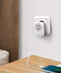 Europe Travel Plug Adapter With USB C Port Not For UK Wall Charger in use on a white wall, charging a smartphone.