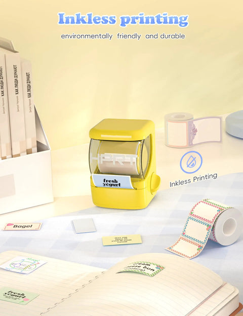 Hassle Free Bluetooth Label Maker With Straightforward Phone Sync And One Included Thermal Tape Roll Sweet For Quick Diy Crafting And Super Clean Home Tagging In Bright Yellow on desk with labels and notebook.