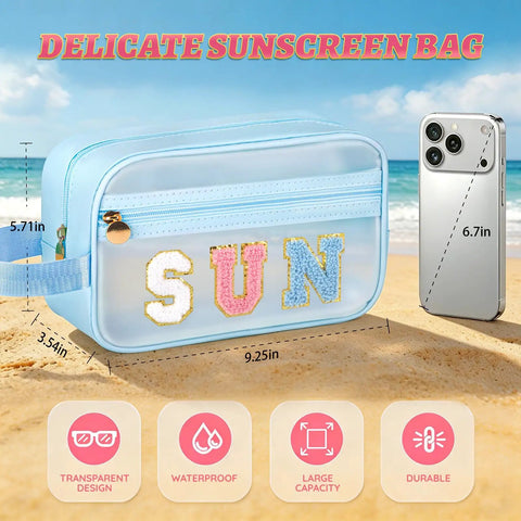 Clear SPF Sunscreen Bag With Handle For Beach And Pool, waterproof toiletry bag on sand next to smartphone