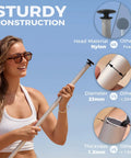 Woman holding a pole showing sturdy construction for No Fuss Setup Beach Tent Sun Shelter With Four Poles Big Sandbags And Shovel