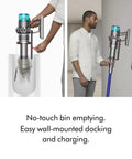 Gen5 Outsize Cordless Vacuum With 250AW Suction, wall-mounted charging, easy no-touch bin emptying demonstration.
