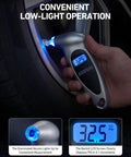 Hand using Digital Tire Pressure Gauge 0 To 150 PSI With Backlit LCD And Presta Valve Adaptor Included on tire at night