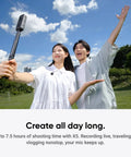 Two people using Wireless Mic Air Transmitter For Vlog And Streaming, Ultralight 7.9g, in a park setting while recording.