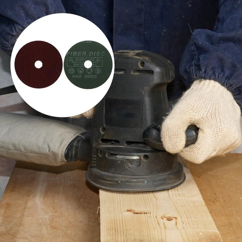 50Pcs Metal Grinding Disc Set Four Inch Red Alumina Abrasive Sheets For Aluminum And Wood in use on wood surface
