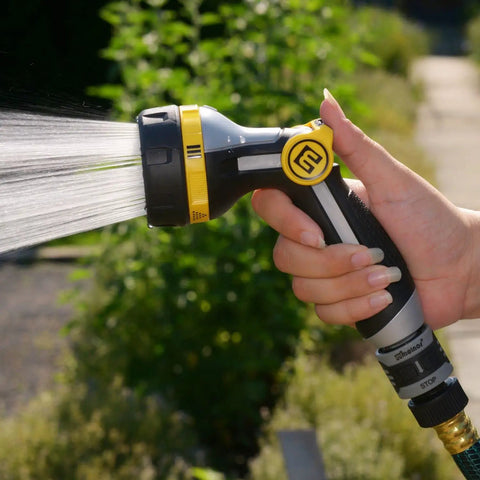 Relaxgrip Gardening Nozzle And Wash And Fill Set with No Squeeze Thumb Control spraying water in garden