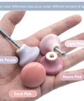 Upgrade Your Cabinets With This Sweet Set Of Sixteen Coral Pink Ceramic Cabinet Knobs Featuring Smooth Round Profiles No Sweat Installation And Top Shelf Hardware, showing various pink ceramic knobs in hand.