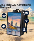 21.5 Inch Portable Lcd Backpack Signboards For Street Marketing Fly Setup Crisp Hd Touchscreen Digital Adboard With Phone App Sync And Hella Mighty Battery, showcasing LCD backpack features on beach background.