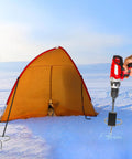 Go To Ice Shelter Anchor Kit For Ice Fishing Setup with drill adapter securing tent on ice with anchor peg.