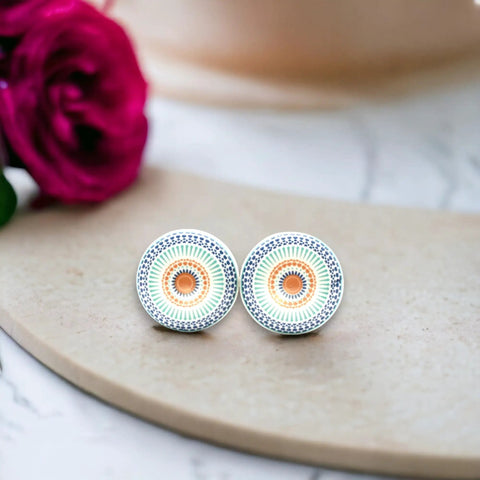 Pack Of Eight Vibrant Mandala Ceramic Cupboard Knobs 40mm Drawer Pulls With Washers on a stone surface, showing ceramic rose design.