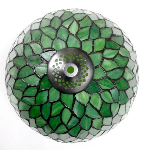 Top view of green stained glass shade of Tiffany-style lamp, part of Green Tiffany Style Stained Glass Table Lamp For Desk And Bedside Use 12x12x18 Inch Antique Green Bronze Base UL Listed Cozy Reading Light For Bedroom Living Room Or Home Office Decor.