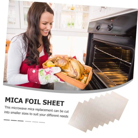 Woman placing tray in oven with 10 Pack Mica Sheets For Microwave Oven Heat Resistant Waveguide Insulation Plates Kitchen Accessory
