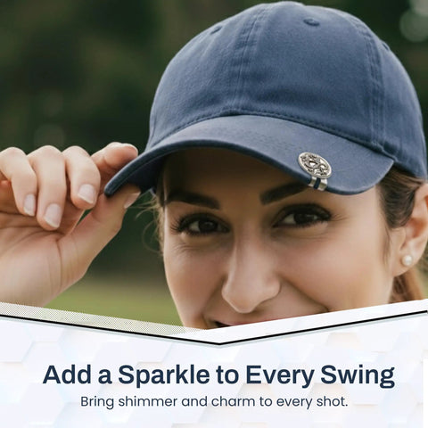 Woman wearing a blue cap with Dragon Golf Ball Marker With Hat Clip, Crystal Red Eye Design, smiling outdoors.
