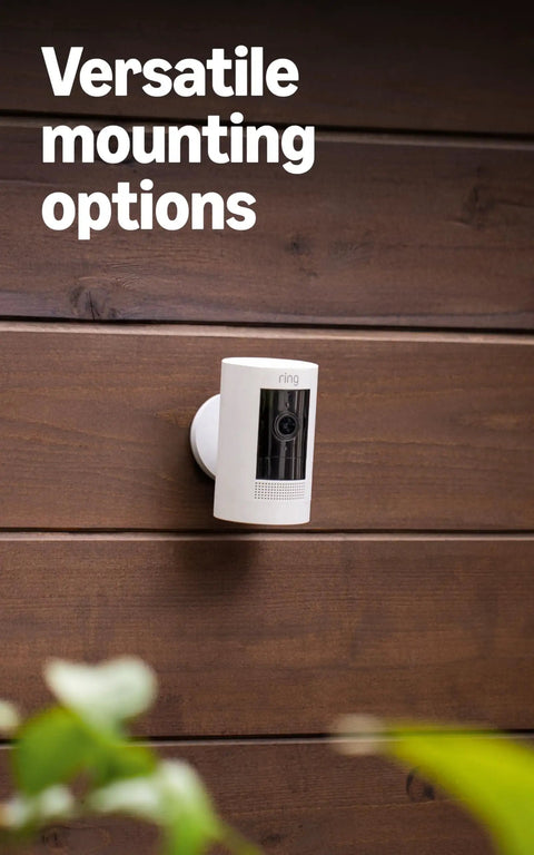 Outdoor Battery Security Camera Stick Up Cam With Live View And Color Night Vision Two Way Talk Motion Alerts Weather Resistant Alexa Compatible Easy Mount For Home Or Business White mounted on wooden exterior wall
