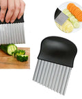 Potato cutter with black handle and stainless steel blades for cutting potatoes into fries; shown slicing cucumber.