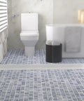 Heavy Duty 3 Inch Rise Shower Threshold Water Dam Adhesive Leak Blocker Guards Bathrooms on tile floor with white toilet.