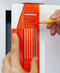 DIY Friendly No-Fuss All In One Cabinet Door And Drawer Drill Mounting Template in use on white cabinet for precise installation