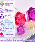 Front view of epoxy resin pigment set; translucent crystal gems in pink, purple, blue, and yellow; 6 ml bottles, Amazon brand