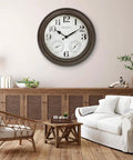 26 Inch Indoor And Outdoor Farmhouse Clock With Thermometer And Hygrometer All In One Weather Station Wall Art And Timepiece For Home Decor In Grey Oak Finish UV Resistant mounted on a wall in a living room setting.