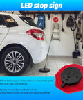 Heavy Duty Led Car Parking Stop Sign With Bright Flashing Warning Light And Rugged Abs Housing showing parked car in garage.