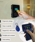 Person using Handheld RFID Card Copier Duplicator For ID IC HID Smart Cards Portable Two Button Operation Easy Read Write Without PC