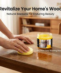 Hand applying beeswax wood polish on table, Furniture Polish And Wood Wax For Hardwood Floors Cabinets And Tables Deeply Restores Finish Revives Wood Grain Long Lasting Shine Keeps Your Wood Lookin Fresh Conditioner And Cleaner For Daily Maintenance jar displayed