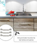 Kitchen scene with Stainless Steel Cabinet Handles 3 Pack T Shape Drawer Knobs mounted on wooden drawers, brushed finish.