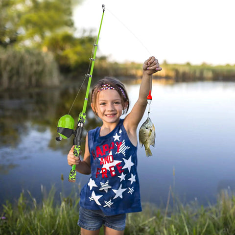 Child holding All In One Kid Friendly Fishing Rod And Reel Set With Tackle Box Lures And Portable Bag by a lake, catching a fish.