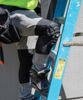 All Day Comfort Lightweight Knee Pads With Padded Sleeves Breathable Mesh Back Elastic Cuff And Slip Resistant Silicone Low Profile Fit For Tight Spaces Worksite Ready Black Medium Large being worn by worker on ladder