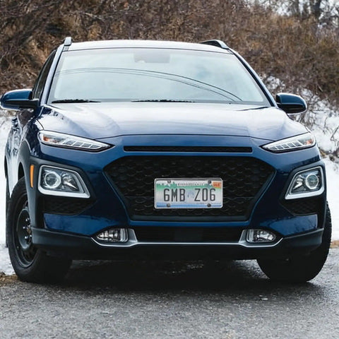 Front view of SUV with 2-Pack Clear License Plate Covers With Screws And Caps, 12.2 X 6.3 Inches, universal fit, crack-resistant ABS shield