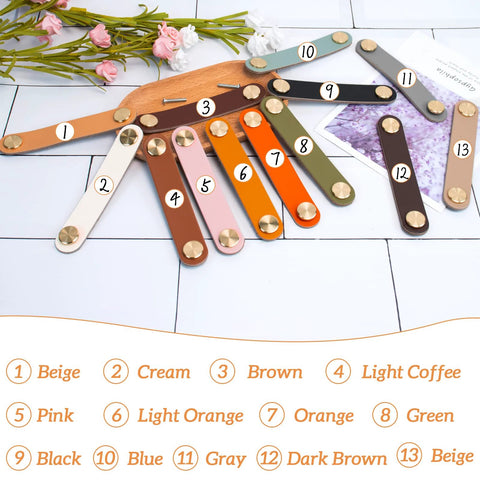 Variety pack of colorful faux leather drawer pulls arranged in fan shape, featuring light coffee, each with single hole and gold accents.