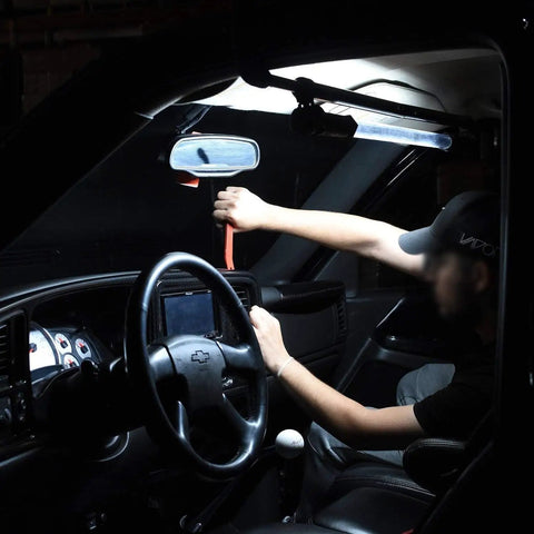 Cordless Underhood Work Light For Mechanics, Rechargeable Li-Ion LED Light Bar With 202 SMD LEDs shown illuminating car interior