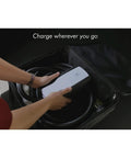 Person placing Level 2 EV Charger 7.6kW Plug-and-Play Home Charger With Dual Voltage 120V/240V in a bag