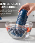 Hand using Cordless OH Ion Purifier Produce Cleaner for Fruits and Veggies Portable Wash System with Gentle Bubble Cleaning