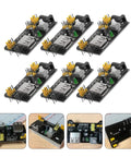 Breadboard Power Supply Module 6.5-12V Input, 3.3V And 5V DC Output, Mb102 Compatible, 6-Pack Portable Design, Ideal For Industry, Lab, School, Makers, And DIY Prototyping. Six black PCB breadboard power modules with USB, barrel jack, and pin headers.
