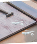Petal Expansion Screws Set M5x60mm for Hollow Walls Drywall Gypsum Board with wall anchors, shown on wood surface