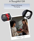 Two people exchanging a gift box with elegant packaging, featuring the brand logo and ribbon, suitable for various occasions.