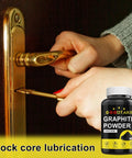 Person applying Ultra Fine Graphite Powder 1000 Mesh 1Lb Dry Lubricant For Locks, Bike Chains, 3D Printing And DIY Projects Conductive And Heat Resistant Non Toxic Lubricant Powder One Pound to a lock with a screwdriver